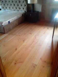 Wide solid cherry wood plank.