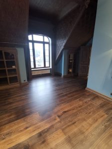 Mansion with black oak flooring.