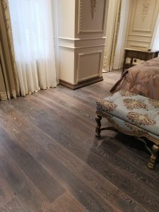 Mansion with black oak flooring.