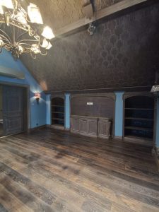 Mansion with black oak flooring.
