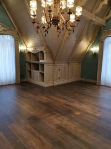 Mansion with black oak flooring.