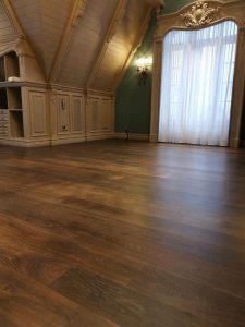 Mansion with black oak flooring.