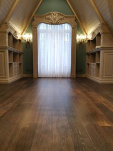 Mansion with black oak flooring.