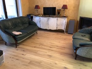 Walls and ceiling finished with light-toned oak.