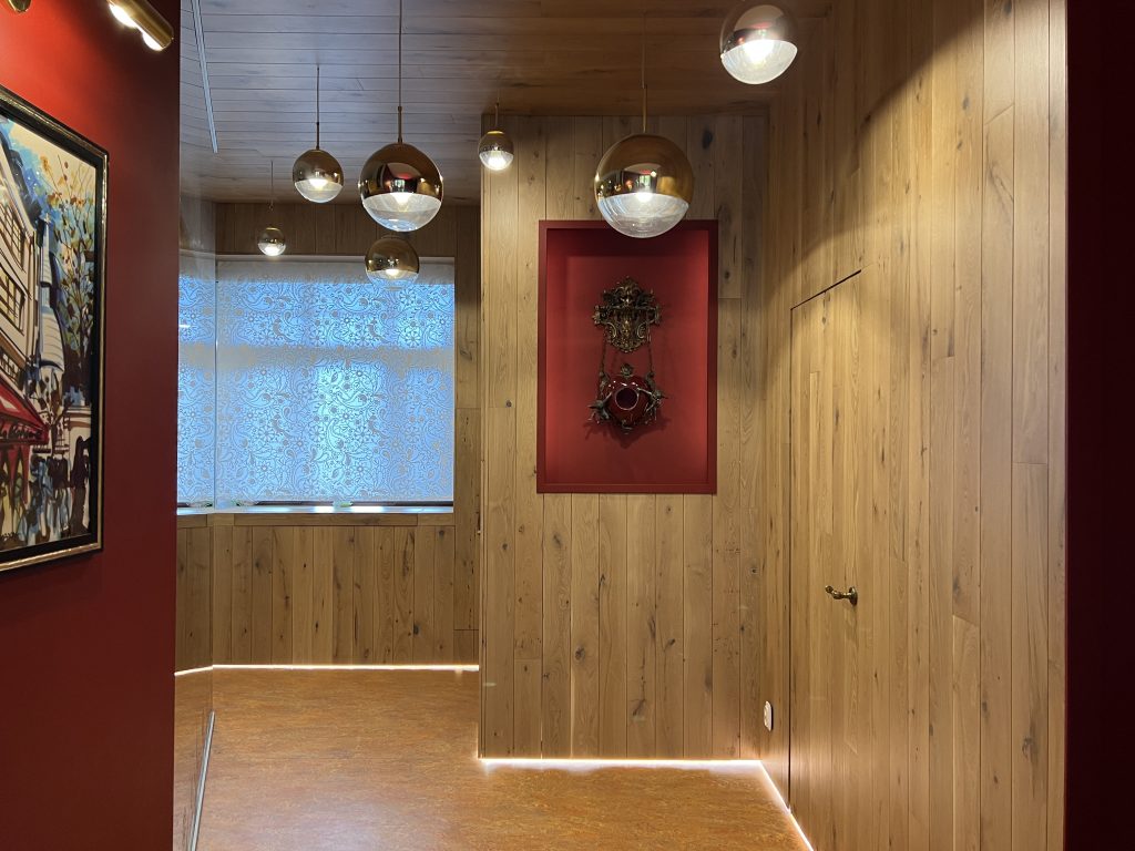 Walls and ceiling finished with light-toned oak.