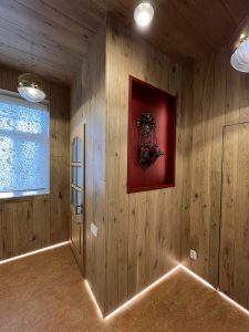 Walls and ceiling finished with light-toned oak.