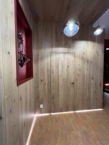 Walls and ceiling finished with light-toned oak.