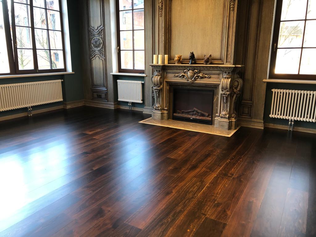 Mansion with black oak flooring.