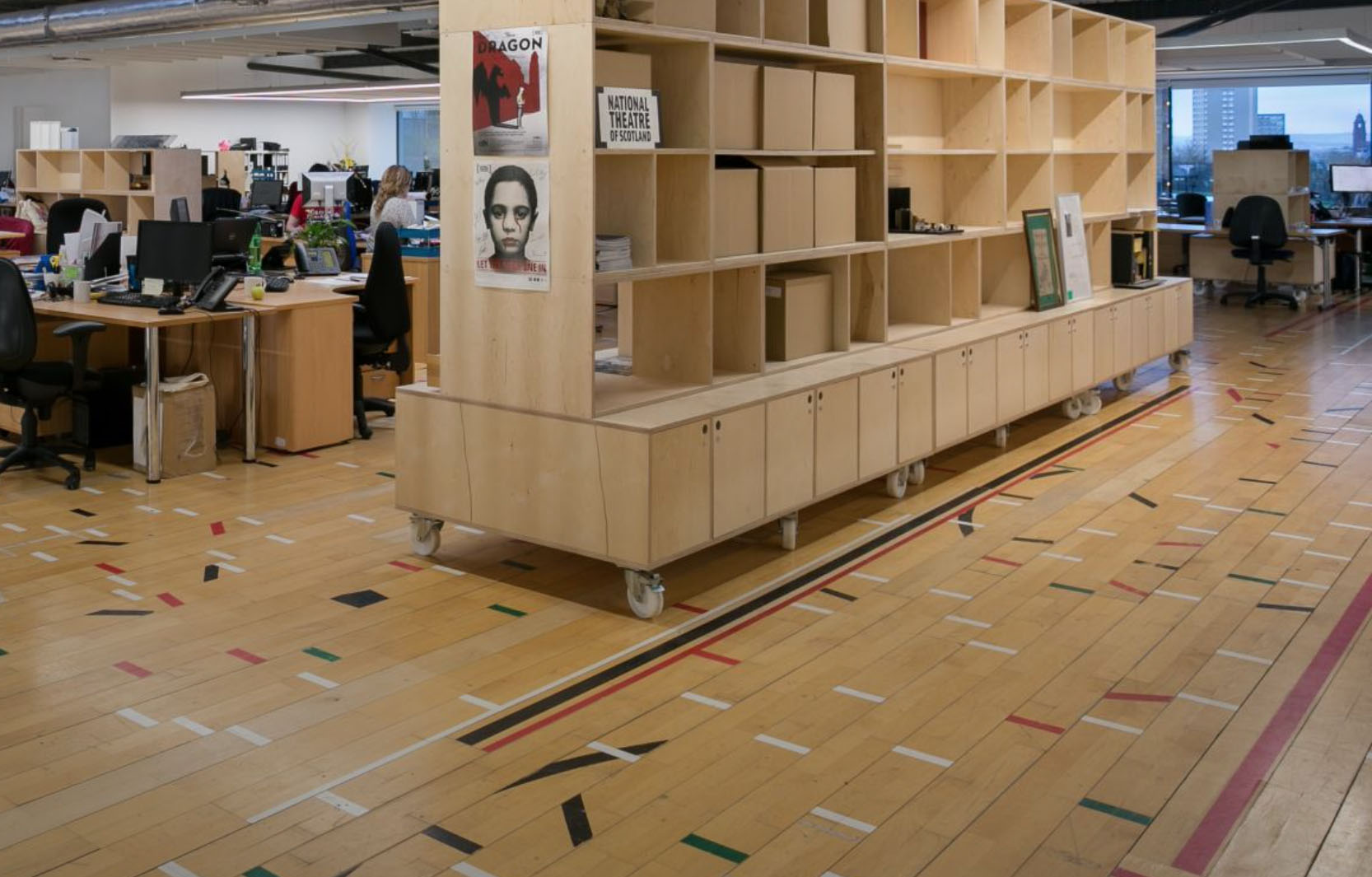 It's a lifetime investment. Each year wood becomes more precious. You may easily deinstall your wood floor, refurbish it or take it with you. See how designers refurbished old sports flooring.